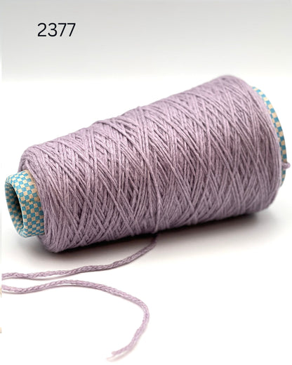 Rare CARIAGGI PIUMA 100% cashmere chainette yarn on original mill cone with original label and lofty cashmere texture.
