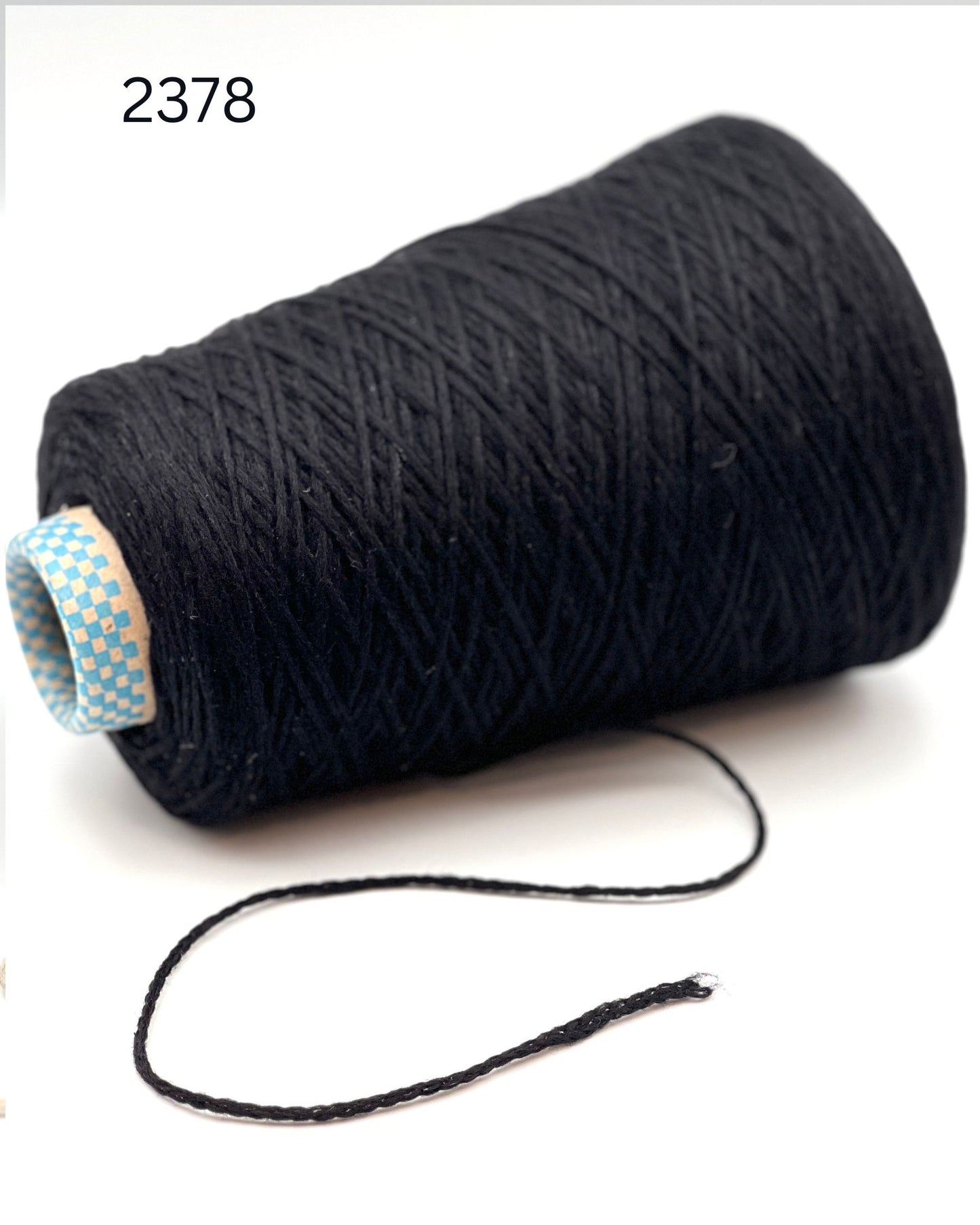 Rare CARIAGGI PIUMA 100% cashmere chainette yarn on original mill cone with original label and lofty cashmere texture.