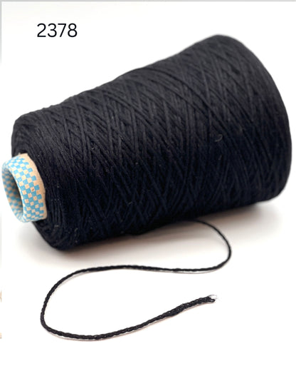 Rare CARIAGGI PIUMA 100% cashmere chainette yarn on original mill cone with original label and lofty cashmere texture.