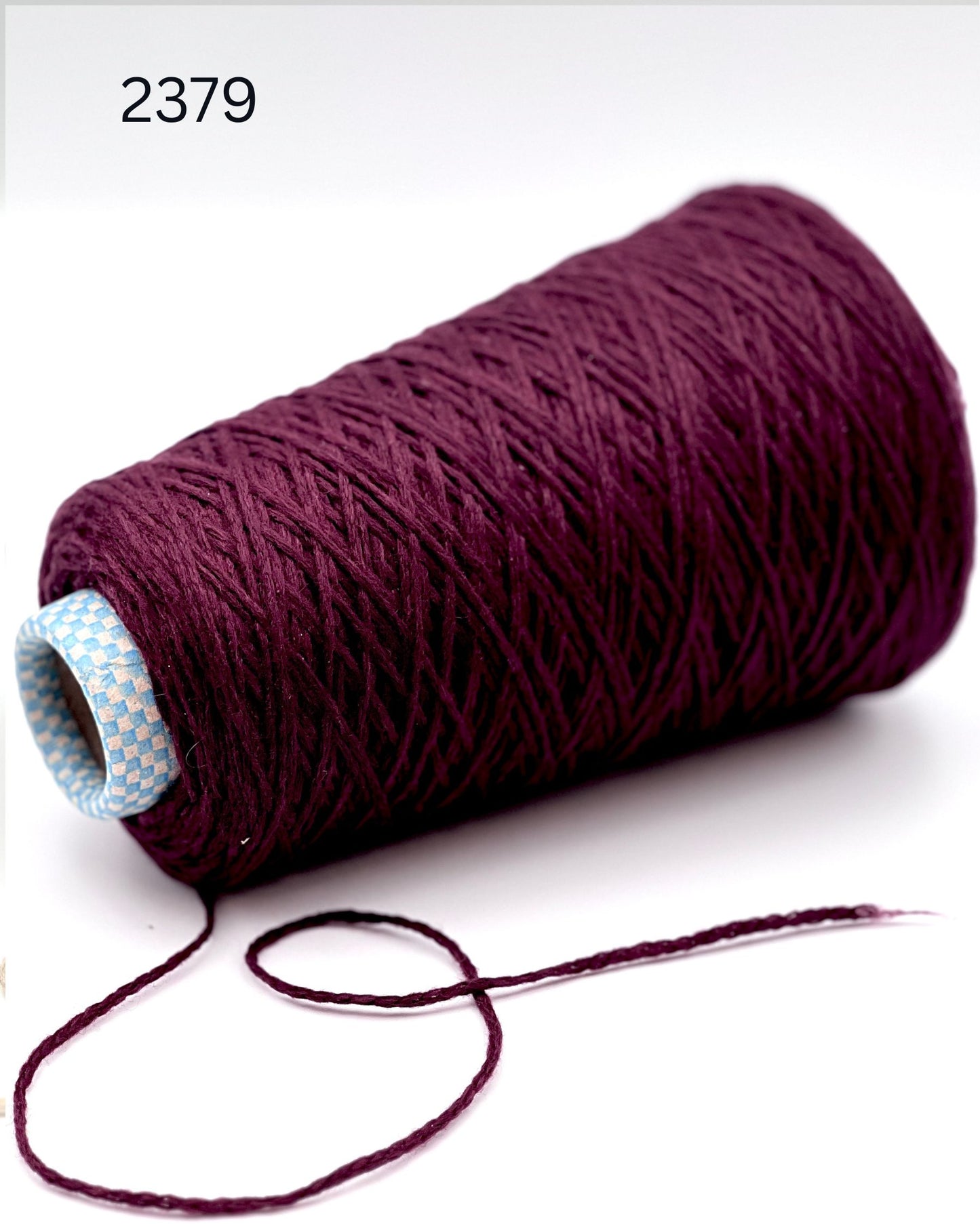 Rare CARIAGGI PIUMA 100% cashmere chainette yarn on original mill cone with original label and lofty cashmere texture.