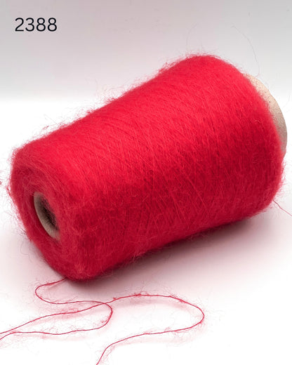 Exclusive iDOKNiT extra fine lace weight yarn, ASTRO by IGEA Italy. A luxury cloud-like blend of 67% superkid mohair, 30% polyamide, and 3% extra fine merino wool providing 1000m per 100g. Authentic Italian-made premium fiber curated by iDOKNiT for airy, delicate lace knitting, lightweight garments, and elegant multi-strand fiber blending.