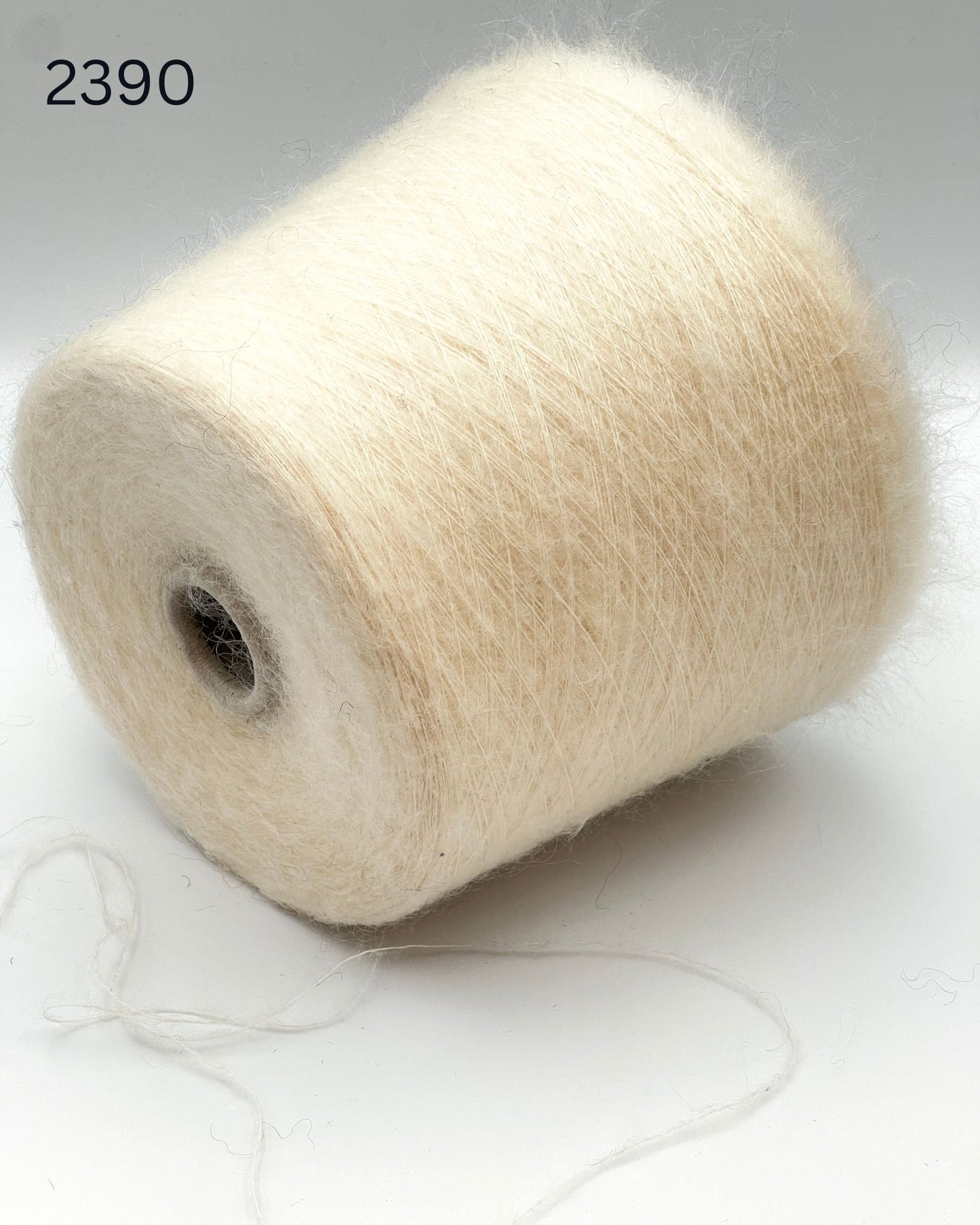 Exclusive iDOKNiT extra fine lace weight yarn, ASTRO by IGEA Italy. A luxury cloud-like blend of 67% superkid mohair, 30% polyamide, and 3% extra fine merino wool providing 1000m per 100g. Authentic Italian-made premium fiber curated by iDOKNiT for airy, delicate lace knitting, lightweight garments, and elegant multi-strand fiber blending.