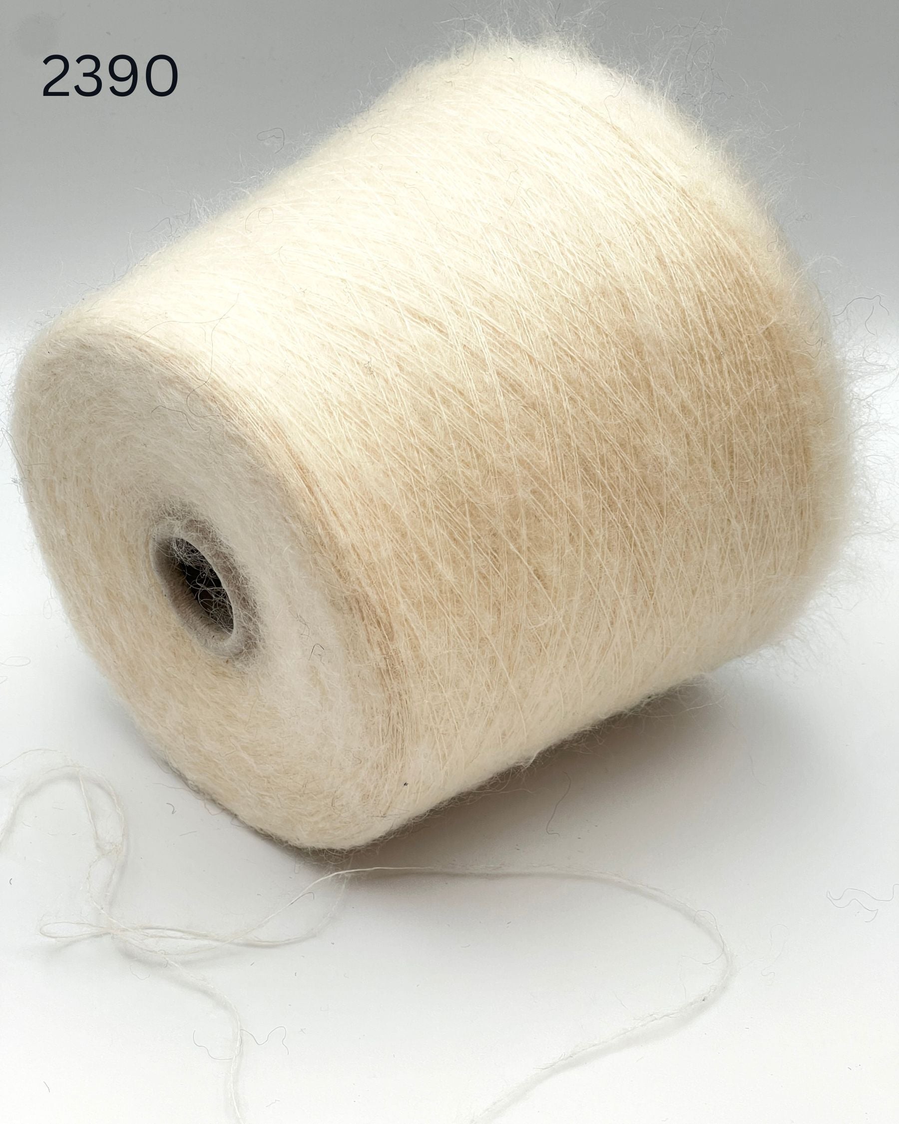 Exclusive iDOKNiT extra fine lace weight yarn, ASTRO by IGEA Italy. A luxury cloud-like blend of 67% superkid mohair, 30% polyamide, and 3% extra fine merino wool providing 1000m per 100g. Authentic Italian-made premium fiber curated by iDOKNiT for airy, delicate lace knitting, lightweight garments, and elegant multi-strand fiber blending.