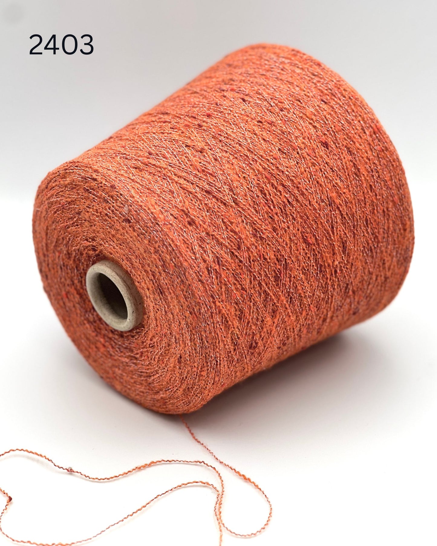 Exclusive iDOKNiT extra fine lace weight yarn, TORRONCINO by Pecci Filati Italy. A luxury fashion tweed yarn blend of 10% cashmere, 48% cotton, 20% merino wool, and 22% polyamide providing 700m per 100g. Authentic Italian-made premium fiber curated by iDOKNiT for lightweight standalone knitting, fine gauge machine knitting, and carrying with companion bases.