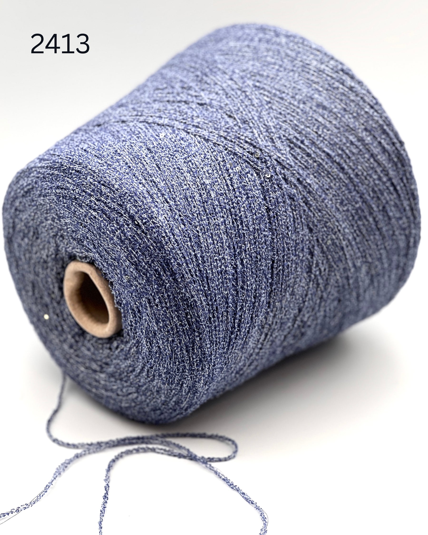 G&G Filati FRIZZ luxury 50% merino wool and 50% silk blend Italian sport weight fantasy boucle yarn in Midnight Blue with integrated 2mm transparent paillettes sequins for runway-ready fashion knitwear at iDOKNiT.