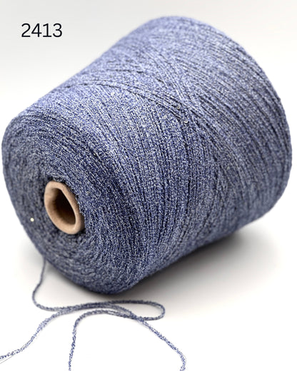 G&G Filati FRIZZ luxury 50% merino wool and 50% silk blend Italian sport weight fantasy boucle yarn in Midnight Blue with integrated 2mm transparent paillettes sequins for runway-ready fashion knitwear at iDOKNiT.