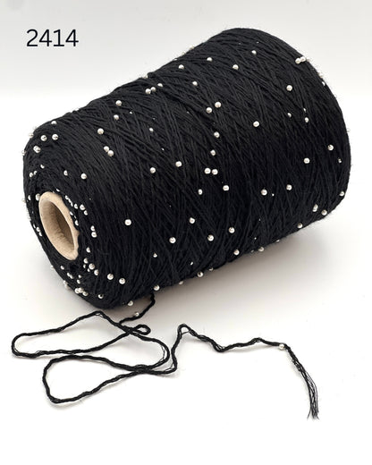 G&G Filati BON-BON luxury 100% merino wool single ply sport weight yarn featuring integrated, generously spaced perline pearl beads wound on an industrial cone for high-end boutique knitwear.