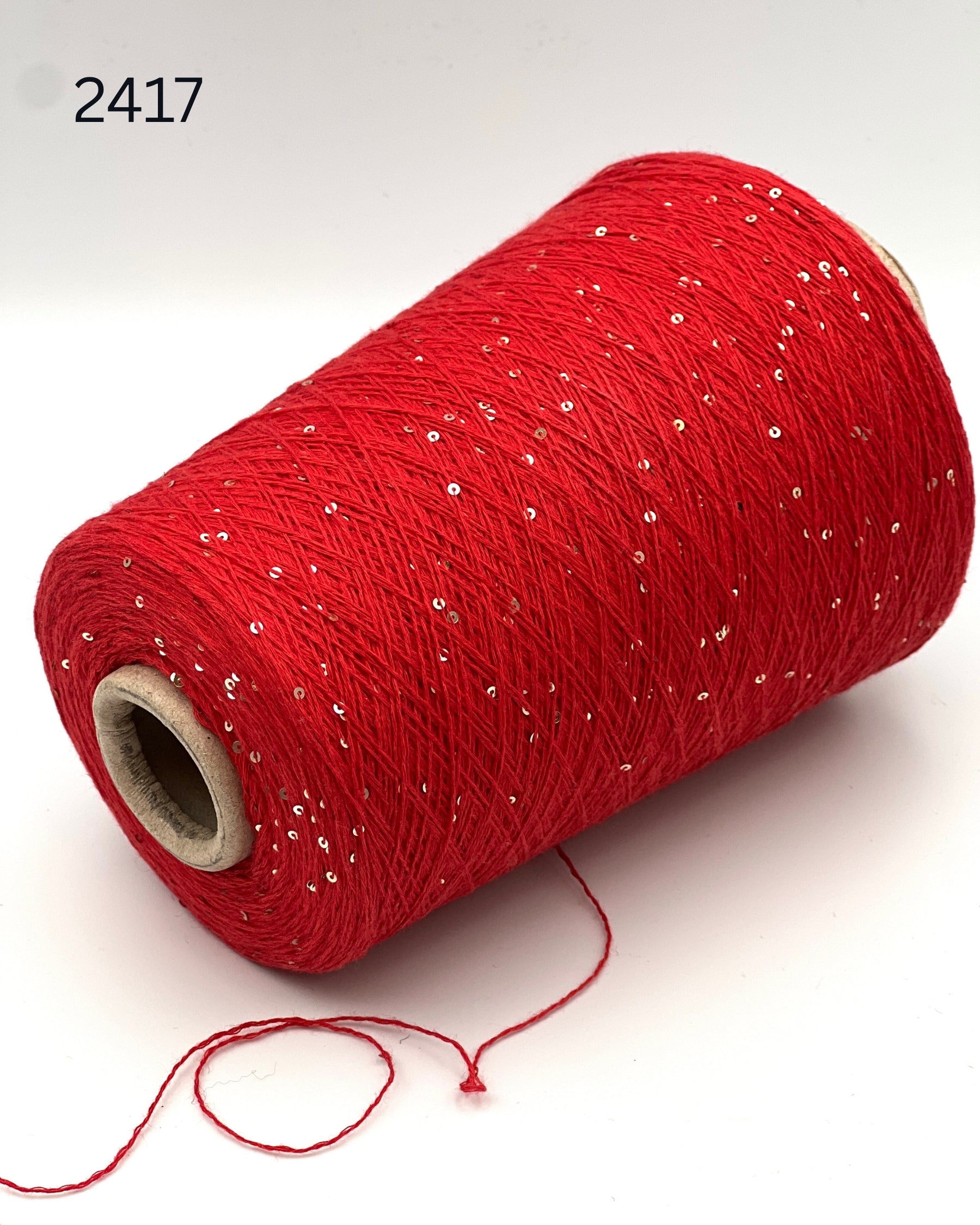 G&G Filati CASH-COTON luxury 85% cotton 15% cashmere lace weight yarn featuring integrated, delicately spaced 2mm paillette sequins wound for high-end boutique knitwear.