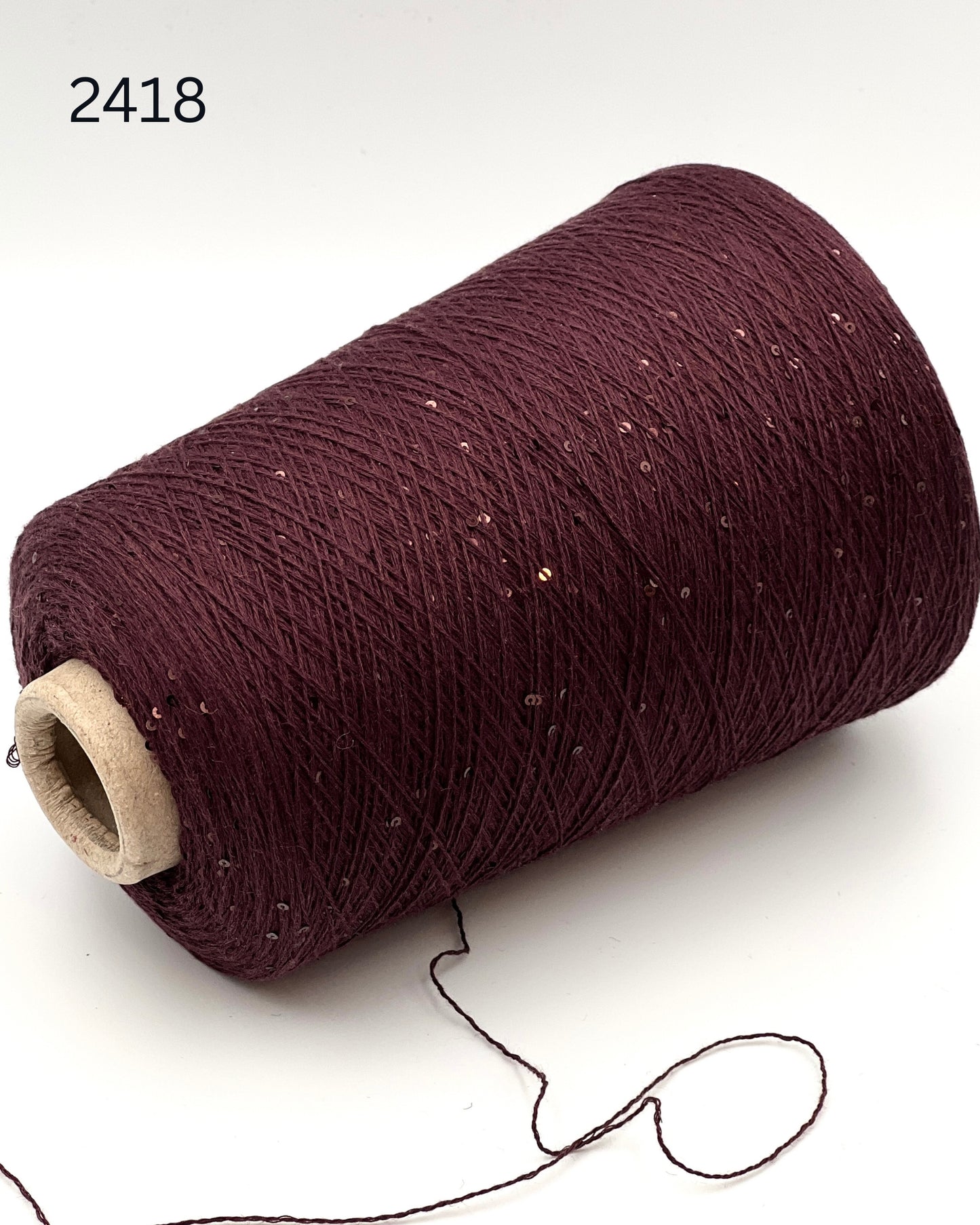 G&G Filati CASH-COTON luxury 85% cotton 15% cashmere lace weight yarn featuring integrated, delicately spaced 2mm paillette sequins wound for high-end boutique knitwear.