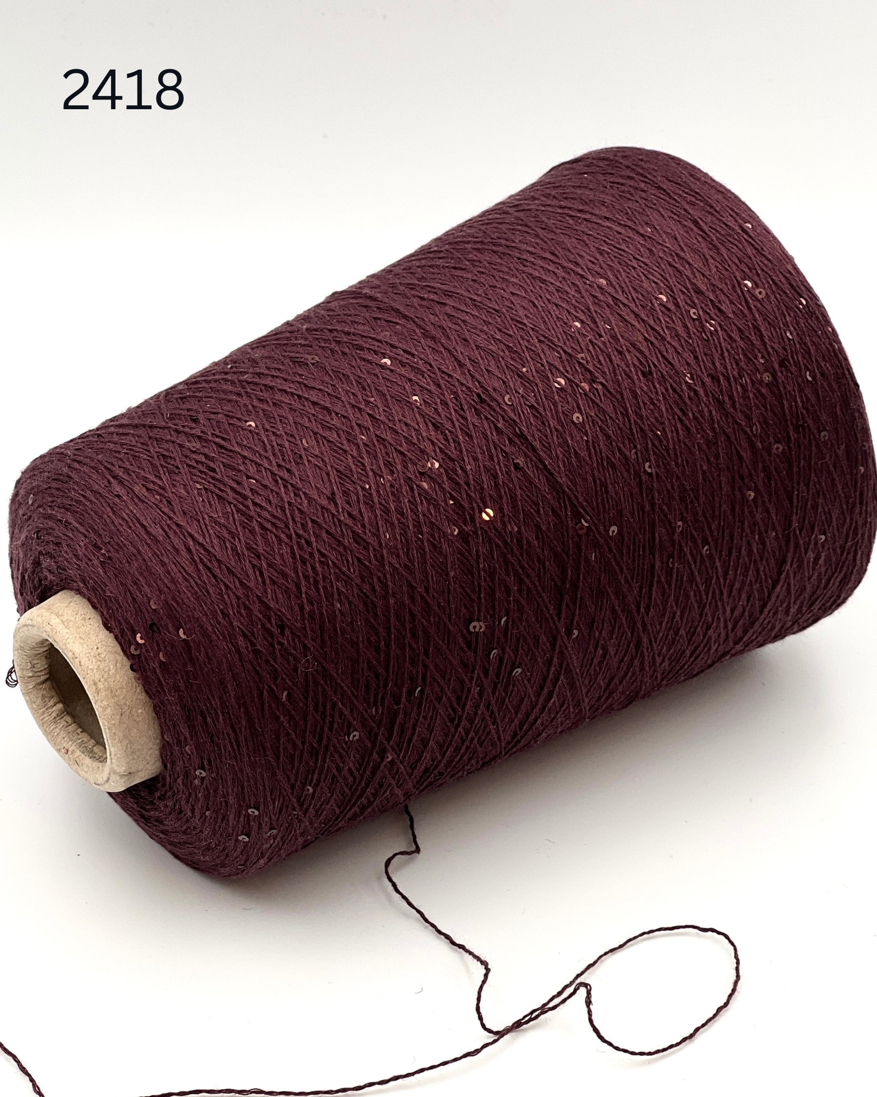 G&G Filati CASH-COTON luxury 85% cotton 15% cashmere lace weight yarn featuring integrated, delicately spaced 2mm paillette sequins wound for high-end boutique knitwear.