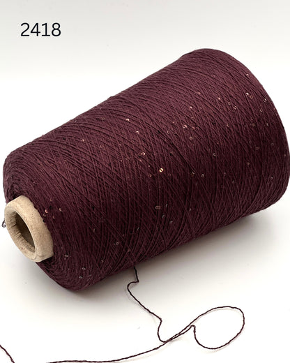 G&G Filati CASH-COTON luxury 85% cotton 15% cashmere lace weight yarn featuring integrated, delicately spaced 2mm paillette sequins wound for high-end boutique knitwear.