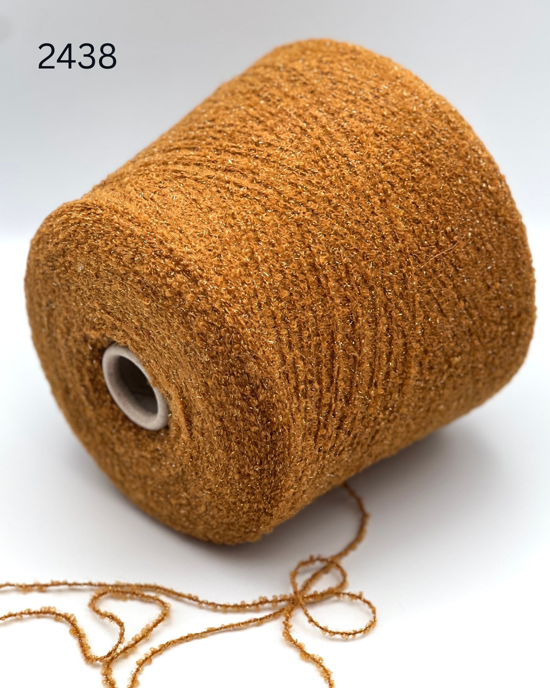 Lanificio Dell Olivo Lumiere Italian alpaca wool boucle fingering weight yarn with integrated metallic lurex on cone from iDOKNiT