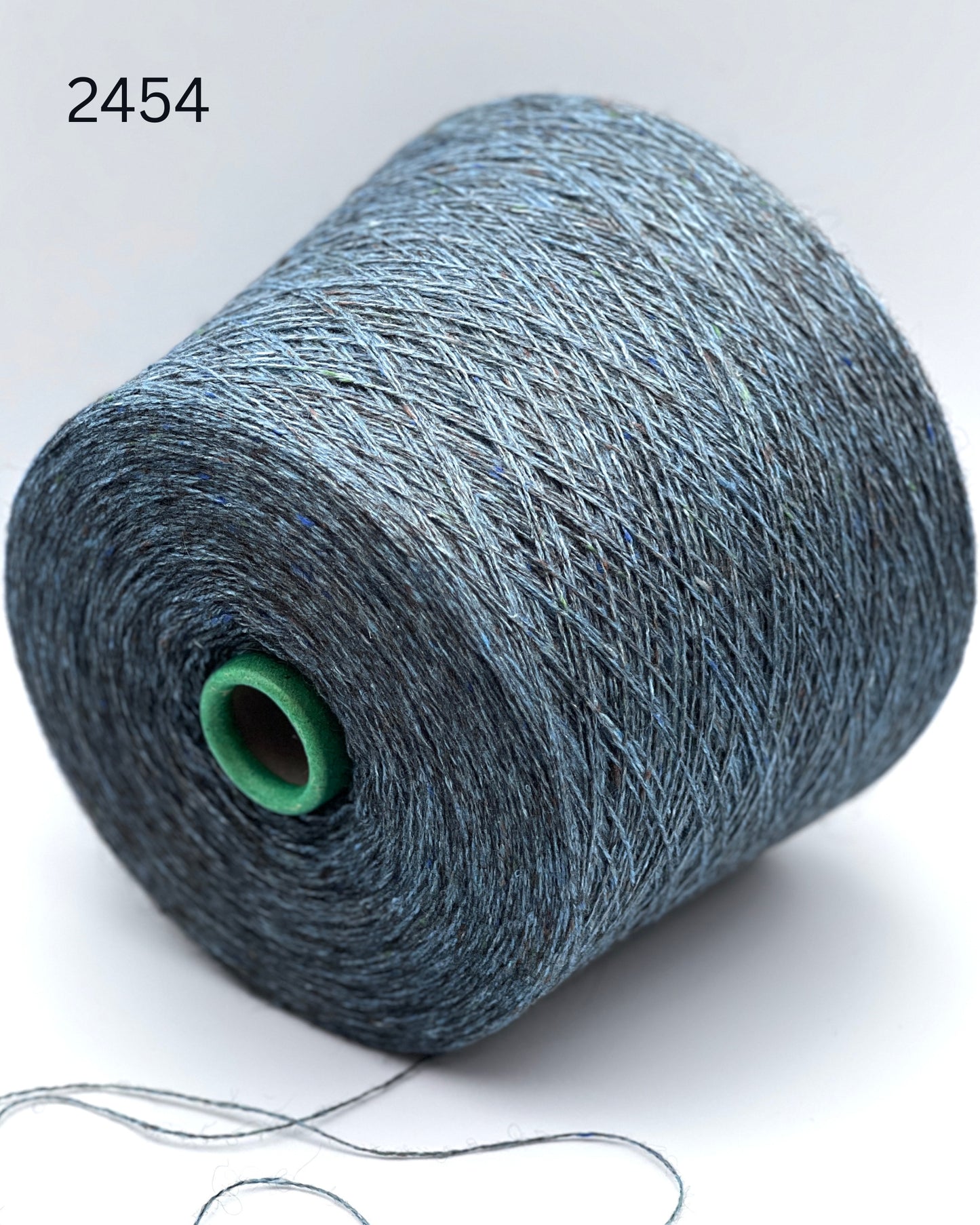 Filcom Pamir Tweed Italian luxury lace yarn spun from an equal blend of natural yak down and silk with colorful tweed flecks from iDOKNiT