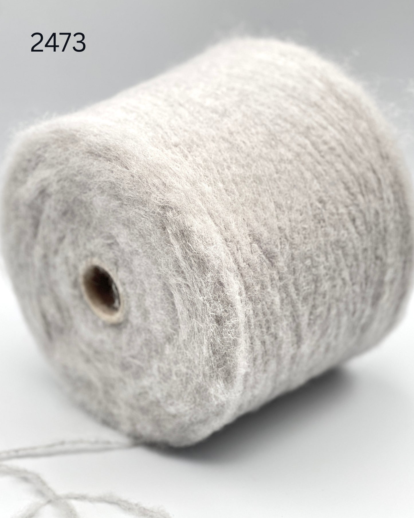 Polipeli Spa Etereog Italian brushed blown baby alpaca fingering weight yarn in hand wound balls from iDOKNiT
