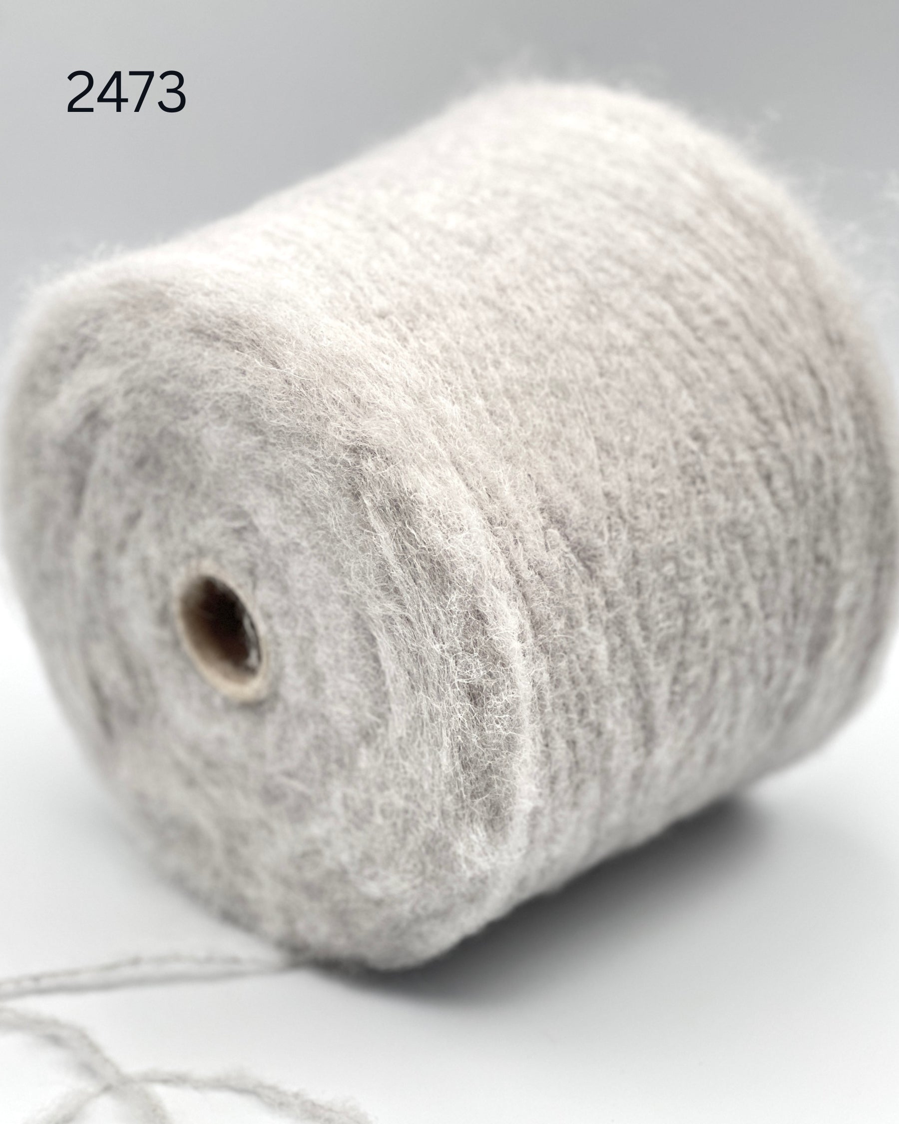 Polipeli Spa Etereog Italian brushed blown baby alpaca fingering weight yarn in hand wound balls from iDOKNiT