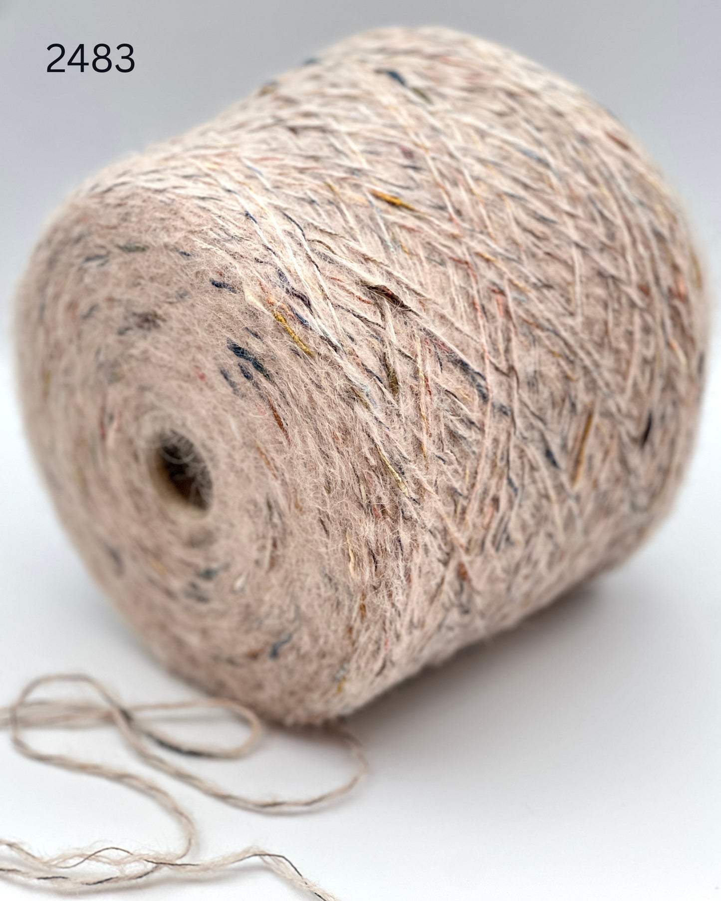 RiGo Taurus Italian baby alpaca boucle textured aran weight yarn in hand wound balls from iDOKNiT