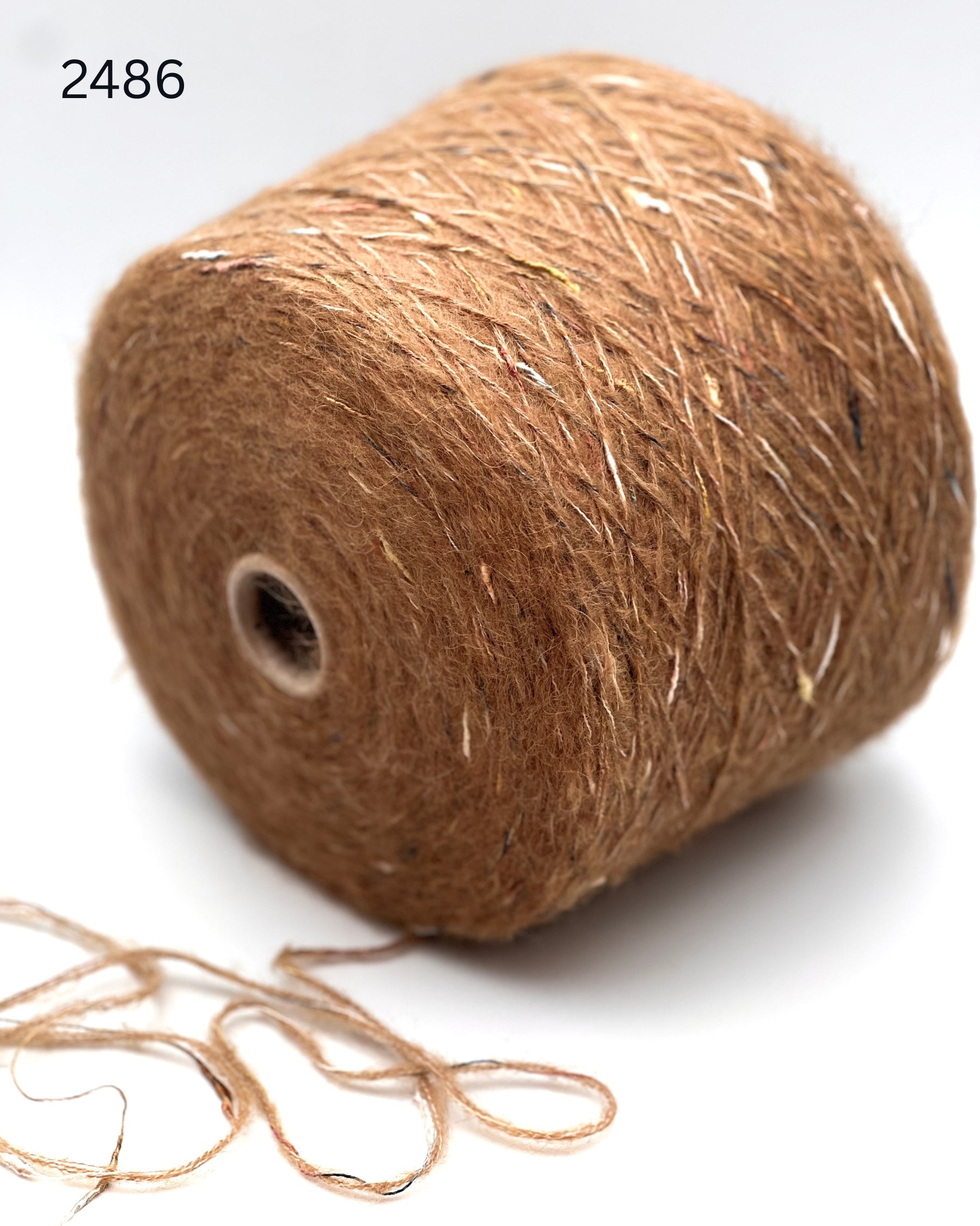 RiGo Taurus Italian baby alpaca boucle textured aran weight yarn in hand wound balls from iDOKNiT