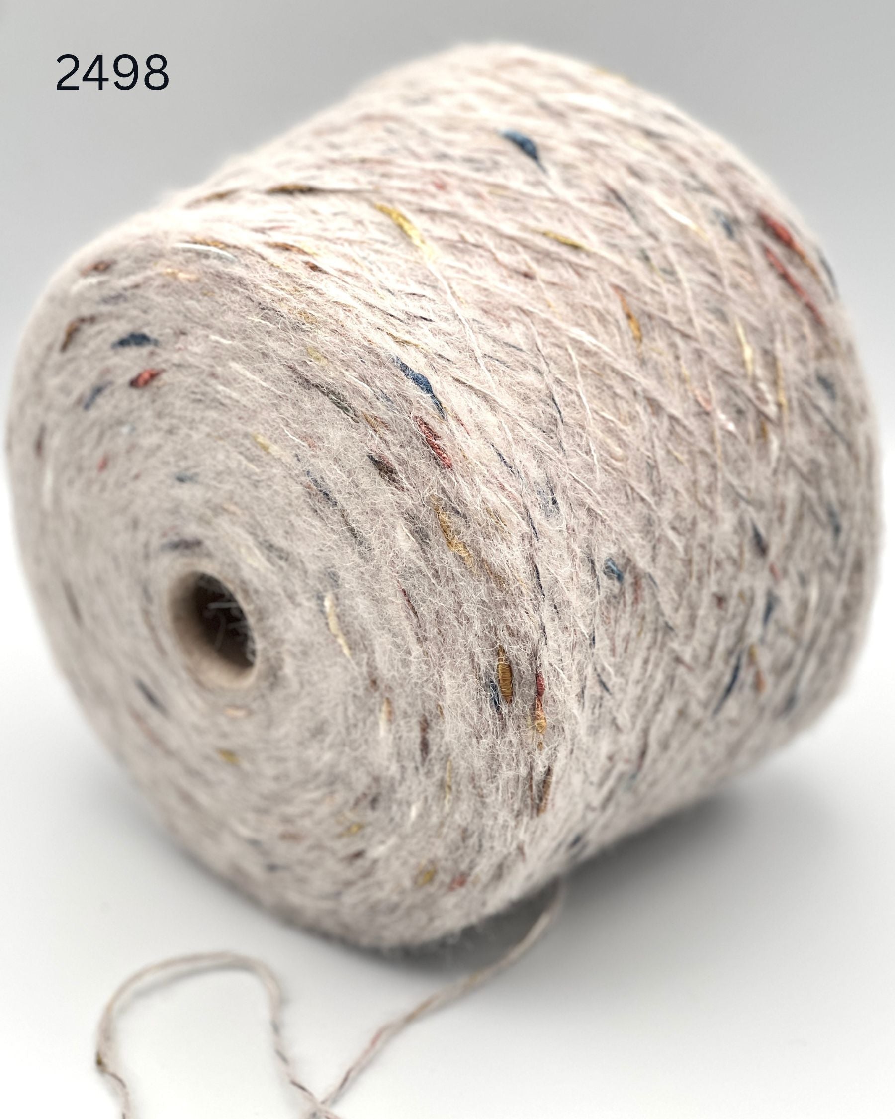 RiGo Taurus Italian baby alpaca boucle textured aran weight yarn in hand wound balls from iDOKNiT