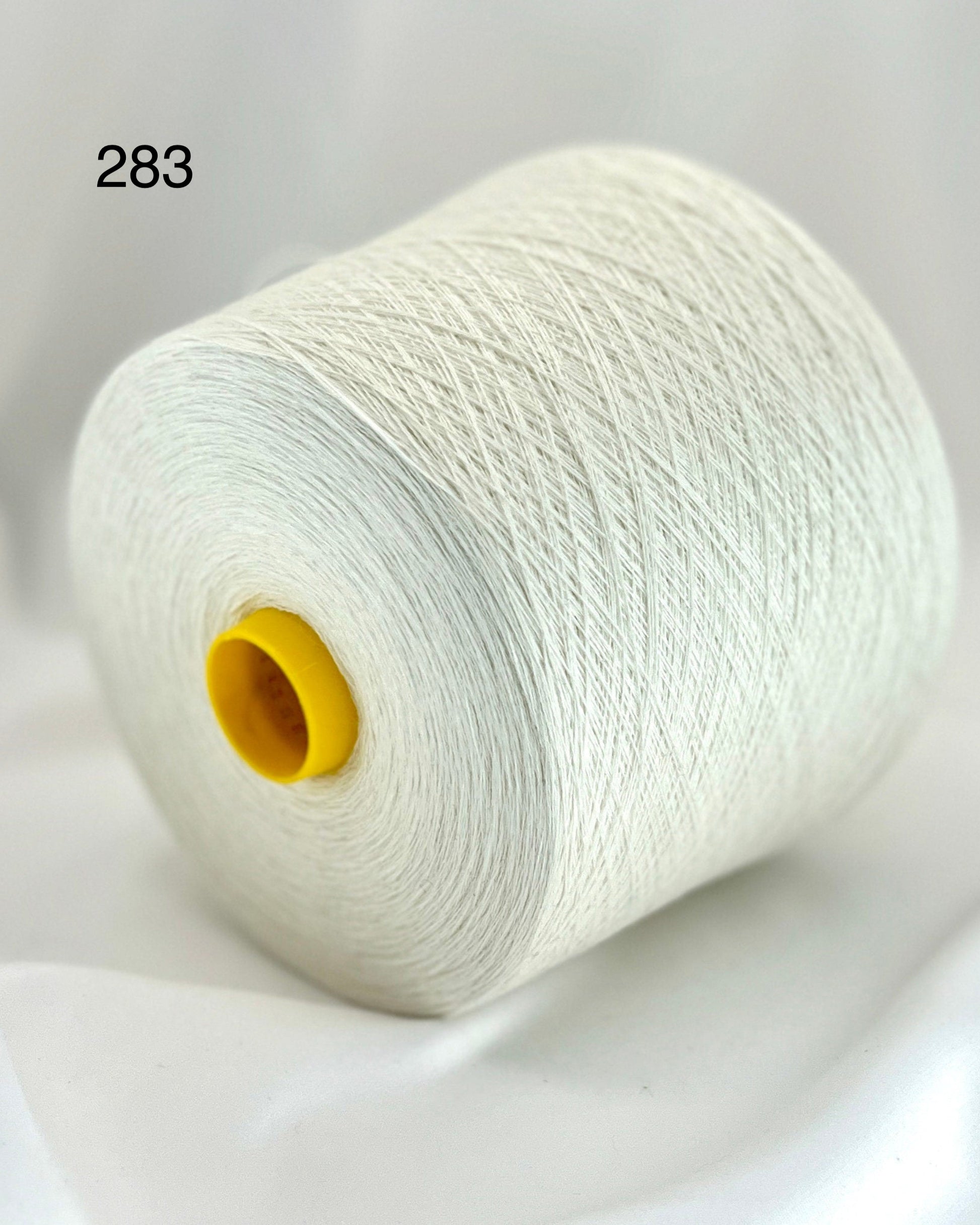 Exquisite iDOKNiT Todd & Duncan ODYSSEY yarn, 50% Cashmere and 50% Cotton blend in Nm 2/36 lace weight, highlighting the premium Scottish texture and soft matte finish for luxury summer knits.