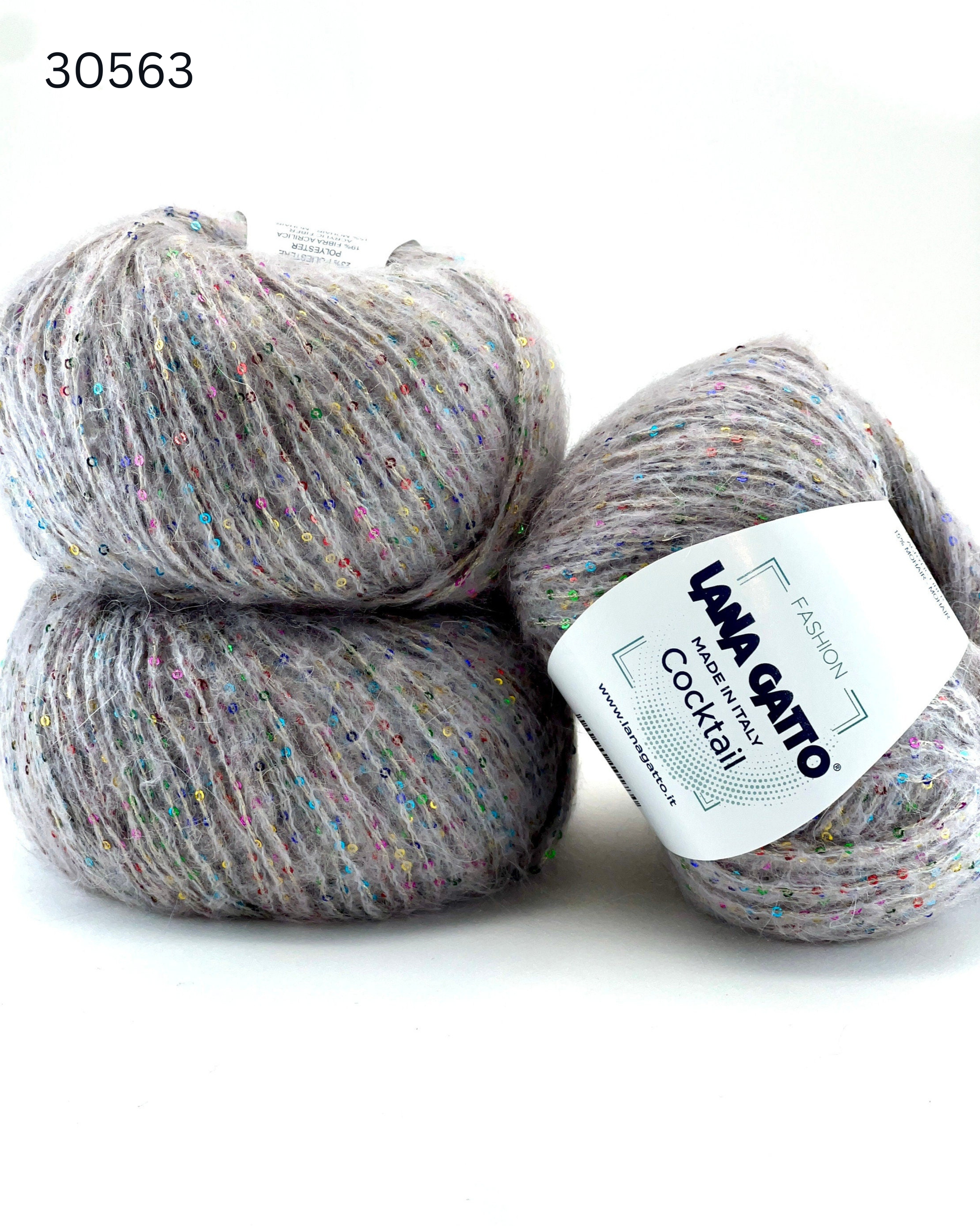 Lana Gatto COCKTAIL paillettes yarn soft sparkle Italian sport yarn
Luxury Italian sport yarn COCKTAIL with mohair halo and sequins
Close up of COCKTAIL yarn showing micro paillettes and texture
Soft sparkle yarn COCKTAIL for sweaters shawls and accessories
Italian fashion yarn with paillettes for festive knitwear