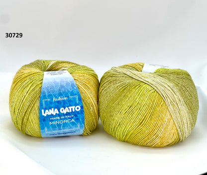 Luxury Italian designer yarn collection for iDOKNiT, featuring premium natural fibers on cones for professional hand-knit and machine-knitting projects.