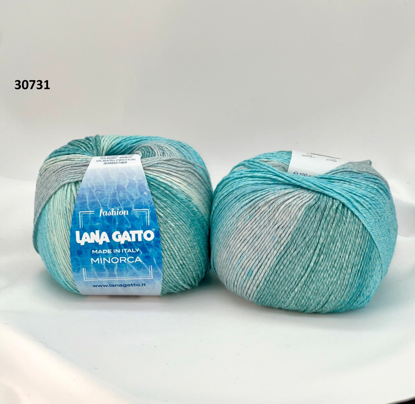 Luxury Italian designer yarn collection for iDOKNiT, featuring premium natural fibers on cones for professional hand-knit and machine-knitting projects.