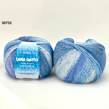 Luxury Italian designer yarn collection for iDOKNiT, featuring premium natural fibers on cones for professional hand-knit and machine-knitting projects.