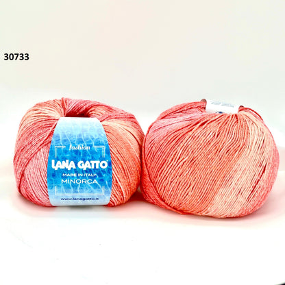 Luxury Italian designer yarn collection for iDOKNiT, featuring premium natural fibers on cones for professional hand-knit and machine-knitting projects.