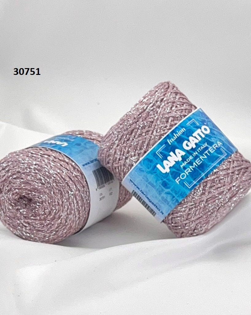 Luxury Italian designer yarn collection for iDOKNiT, featuring premium natural fibers on cones for professional hand-knit and machine-knitting projects.
