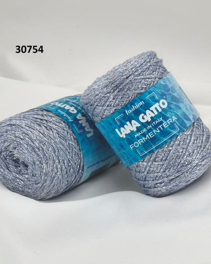 Luxury Italian designer yarn collection for iDOKNiT, featuring premium natural fibers on cones for professional hand-knit and machine-knitting projects.