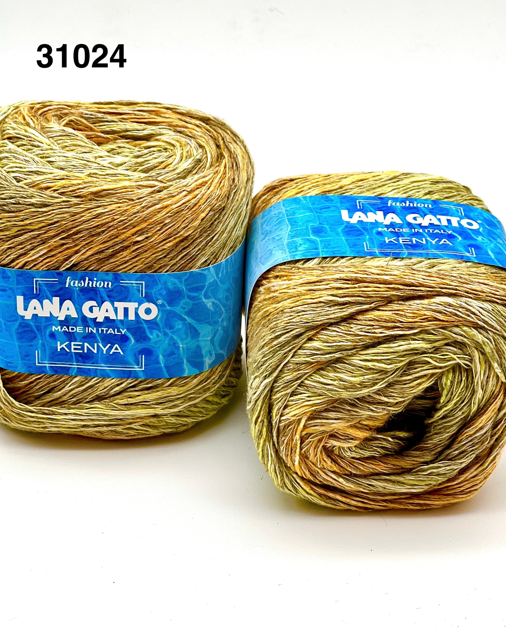 Two skeins of Lana Gatto yarn with blue labels on a white background