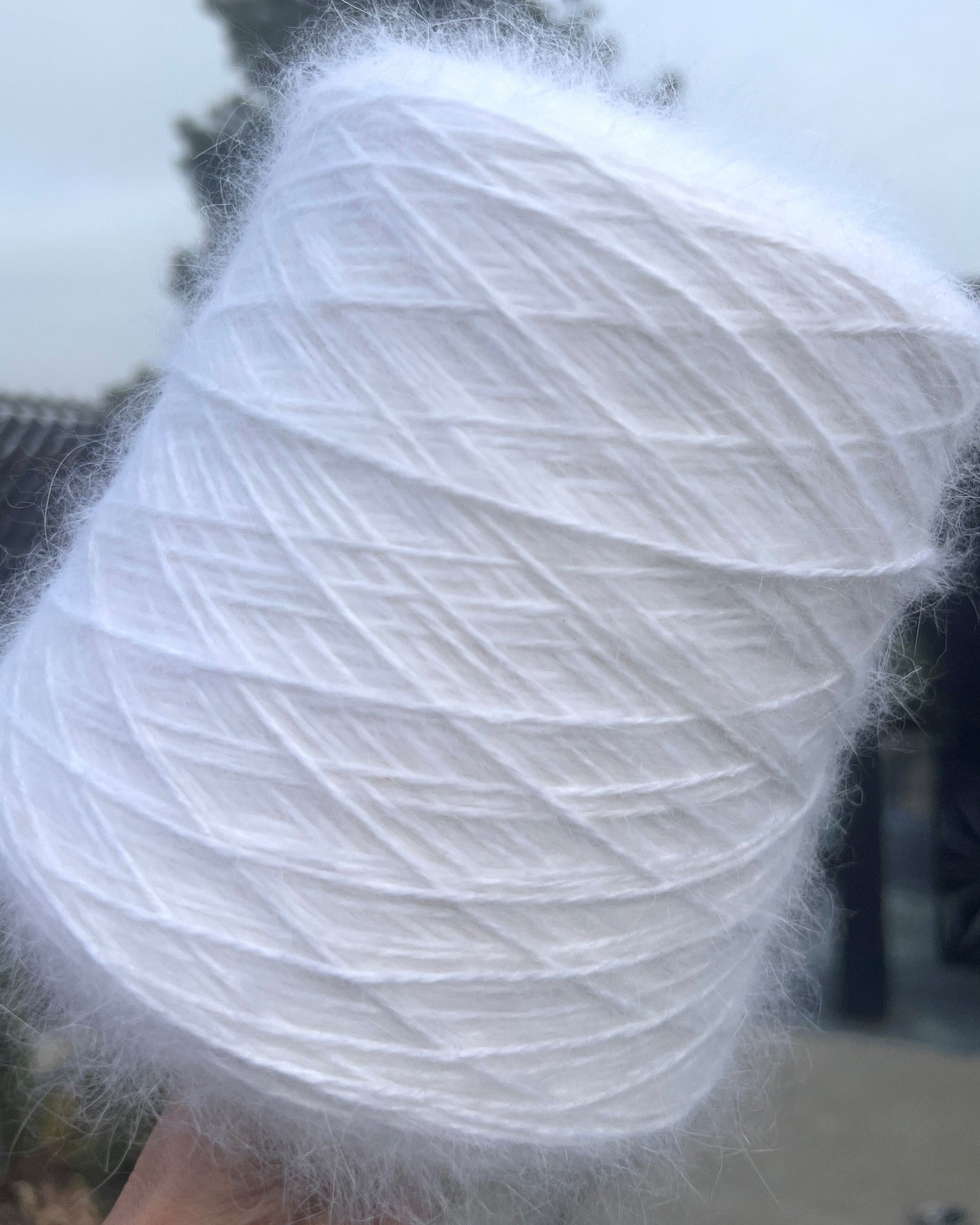 Italian Angora blend yarn by Biagioli Modesto with soft halo and lightweight texture, sport weight yarn for sweaters and accessories, sold by iDOKNiT