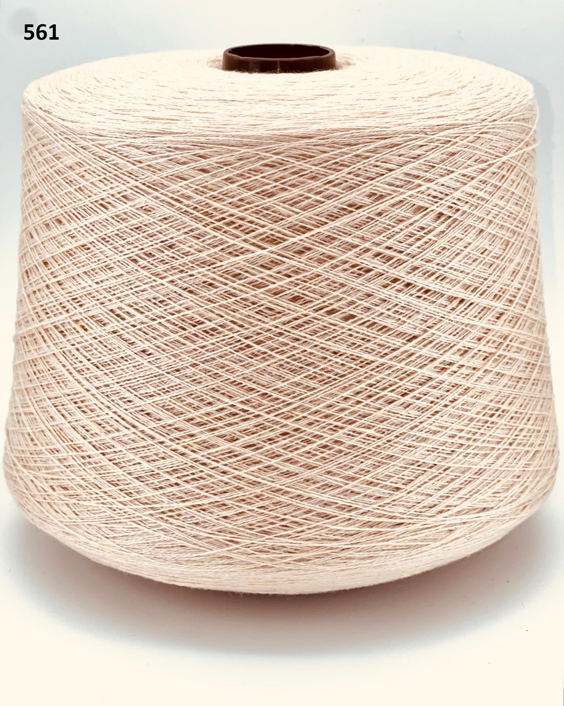 Todd & Duncan 100% Cashmere yarn (2/28 Nm) in a soft neutral palette. Shown as high-quality 2-ply lace weight thread on cones. Made in Scotland. Premium luxury yarn for retail at iDOKNiT.com.
