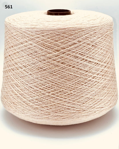 Todd & Duncan 100% Cashmere yarn (2/28 Nm) in a soft neutral palette. Shown as high-quality 2-ply lace weight thread on cones. Made in Scotland. Premium luxury yarn for retail at iDOKNiT.com.