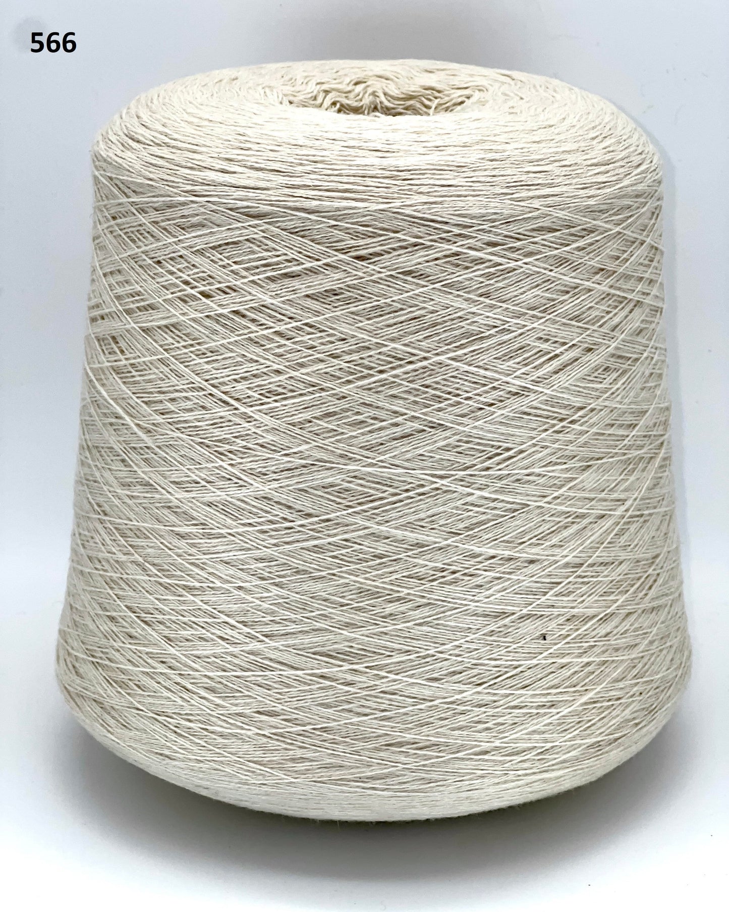 Loro Piana 100% Extra Fine Cashmere lace yarn (2/27 Nm) on a professional cone. Shown in classic neutral shades including Light Camel, Sand Melange, and Ivory. Made in Italy. Available at iDOKNiT.com.