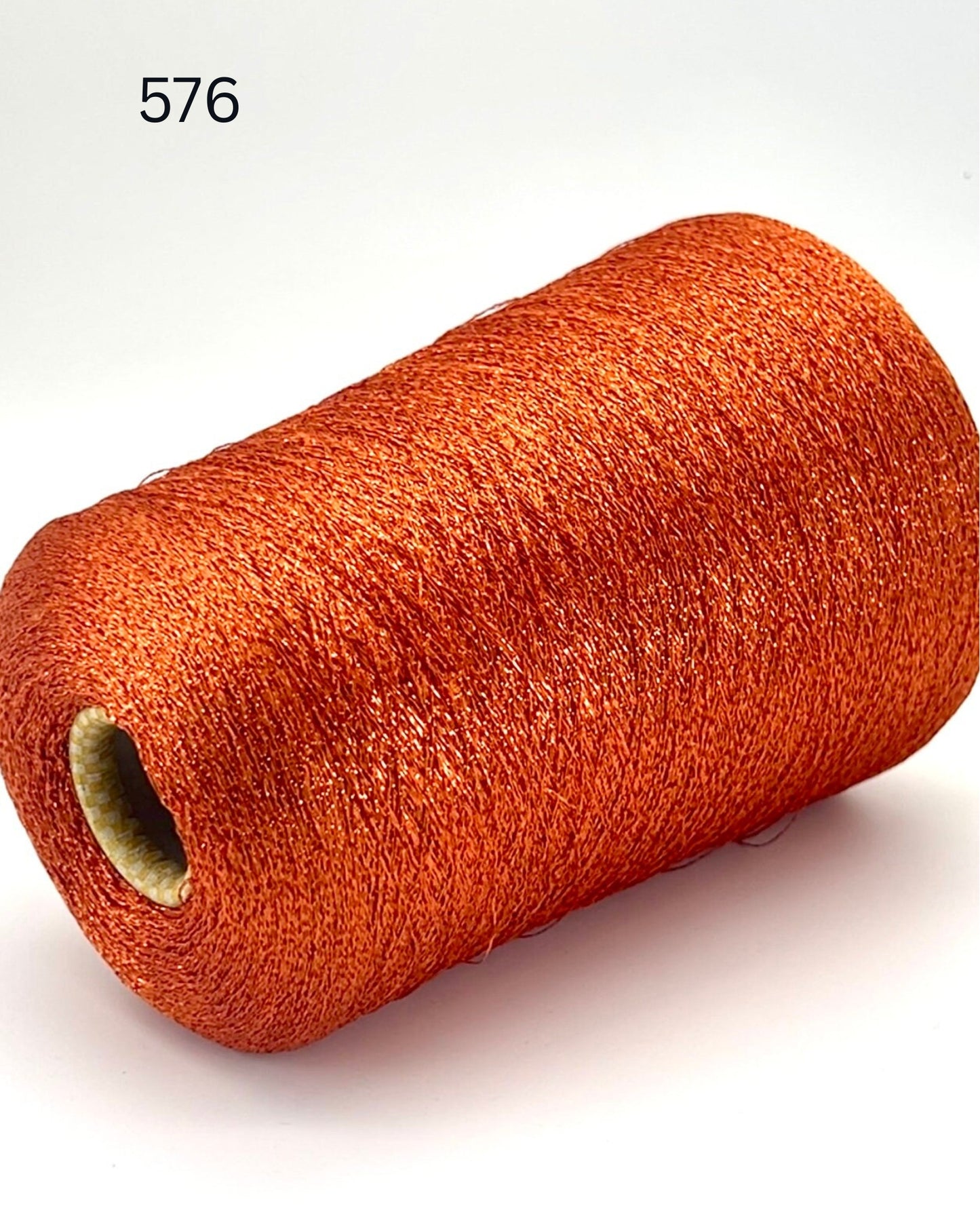 MISSONI DOMASO metallic lurex yarn cone in bright copper orange color, luxury Italian fashion-house yarn