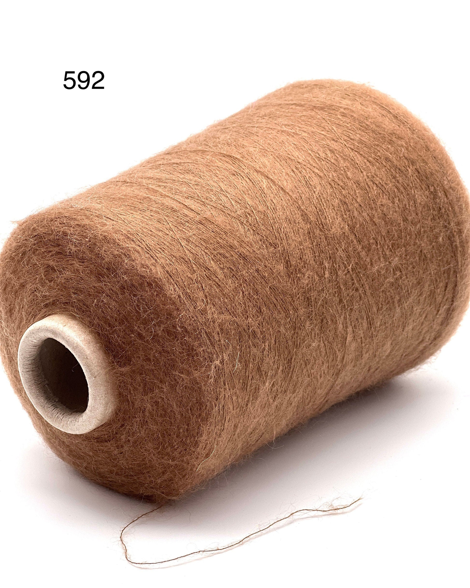 Elite iDOKNiT lace weight yarn, Superkid Mohair blend by Lineapiu Italia. Luxury composition of 58% superkid mohair and 8% wool, Nm 10, providing 1000m per 100g. Authentic Italian-made extra fine yarn curated by iDOKNiT for delicate, airy garments with a signature mohair halo.