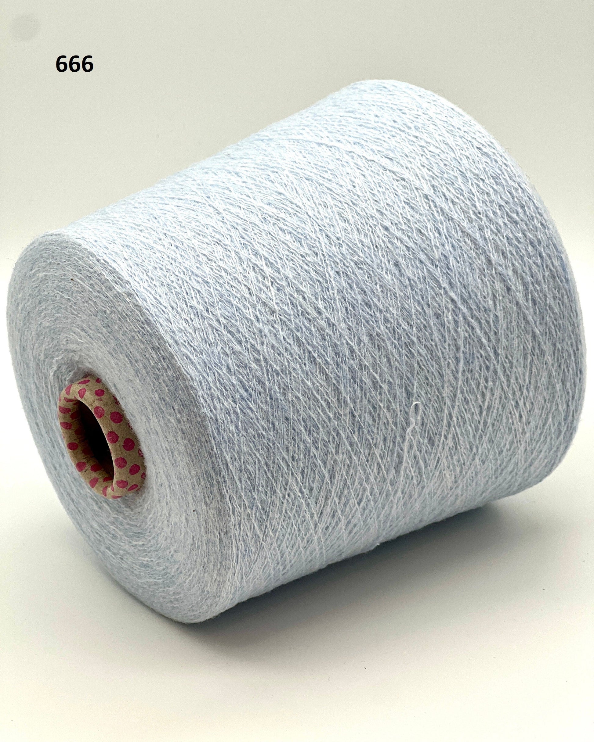 iDOKNiT exclusive: Close-up of Biagioli Modesto VANITY ZERMATT luxury yarn in boucle-style slub texture, a fine Italian cashmere-merino-viscose blend ideal for multi-strand handknitting and machine knitting.