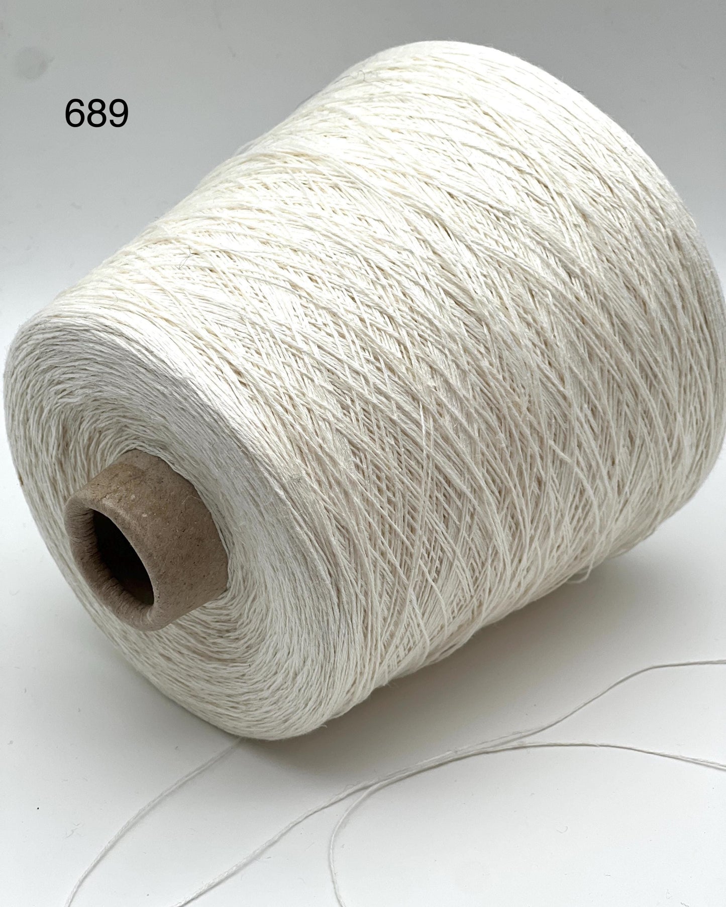 Exclusive iDOKNiT lace weight yarn, LINONE by NEW MILL Italy. 100% pure linen fiber providing 660m per 100g. Authentic Italian-made luxury plant fiber curated by iDOKNiT for breathable, high-end summer garments, available in classic natural, white, and blue shades.