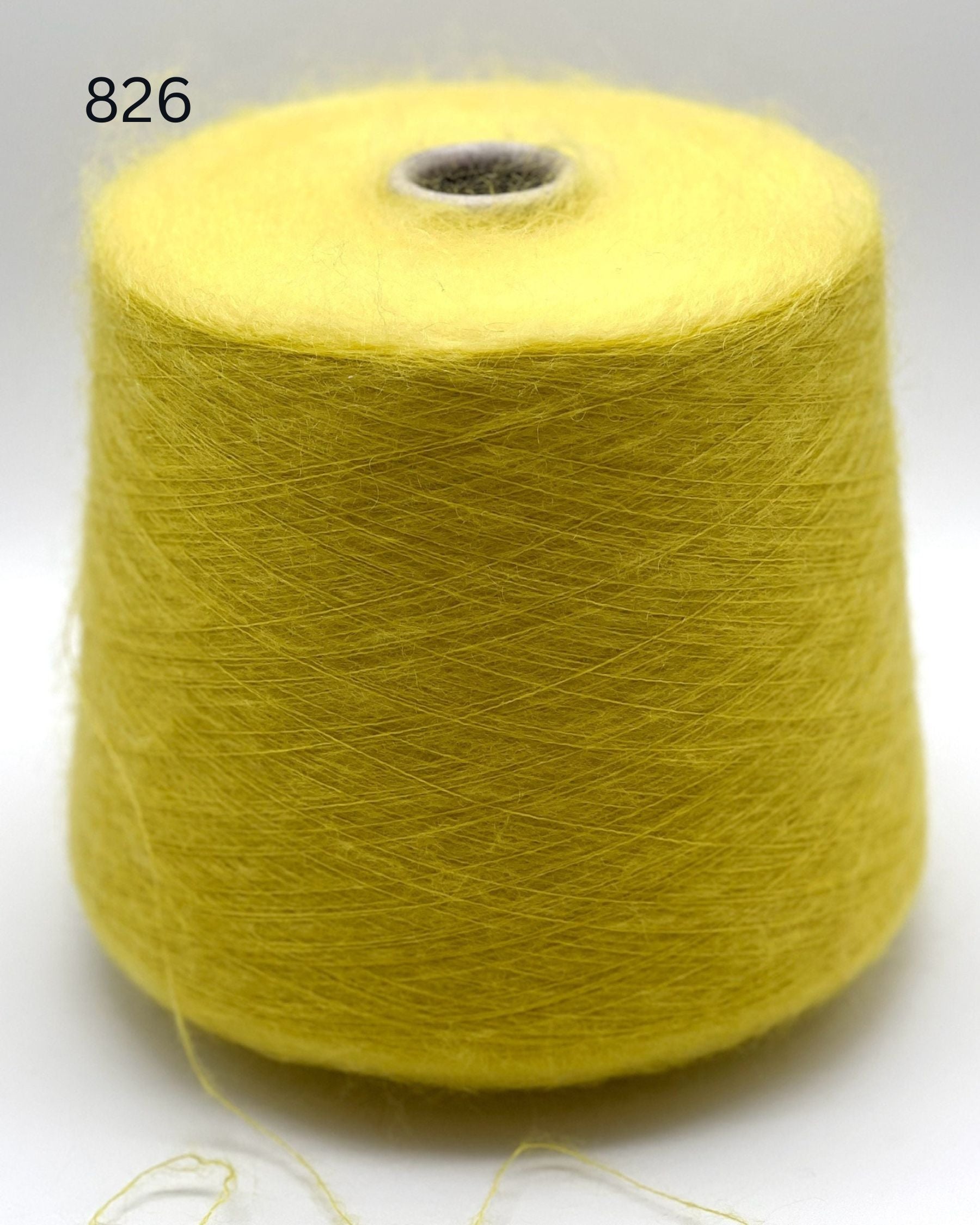 Exclusive iDOKNiT extra fine lace weight yarn, AURORA 100 by Ilaria Italy. A luxury cloud-like brushed mohair blend of 67% superkid mohair, 30% polyamide, and 3% extra fine merino wool providing 1000m per 100g. Authentic Italian-made premium fiber curated by iDOKNiT for airy standalone knitting, delicate lace shawls, and rich multi-strand garment blending.