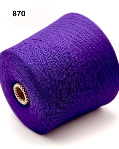 Purple spool of yarn on a white background