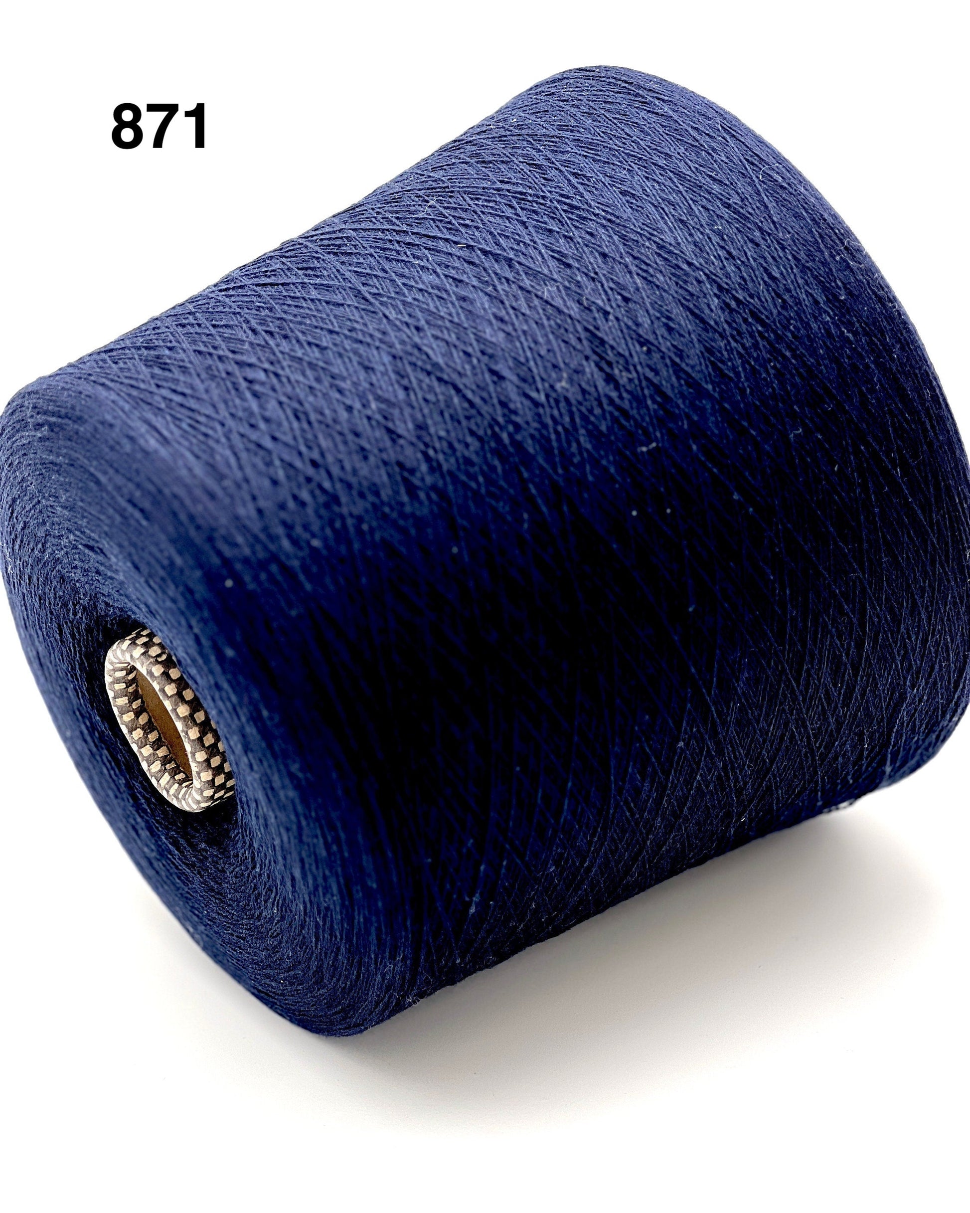 Blue spool of yarn on a white background