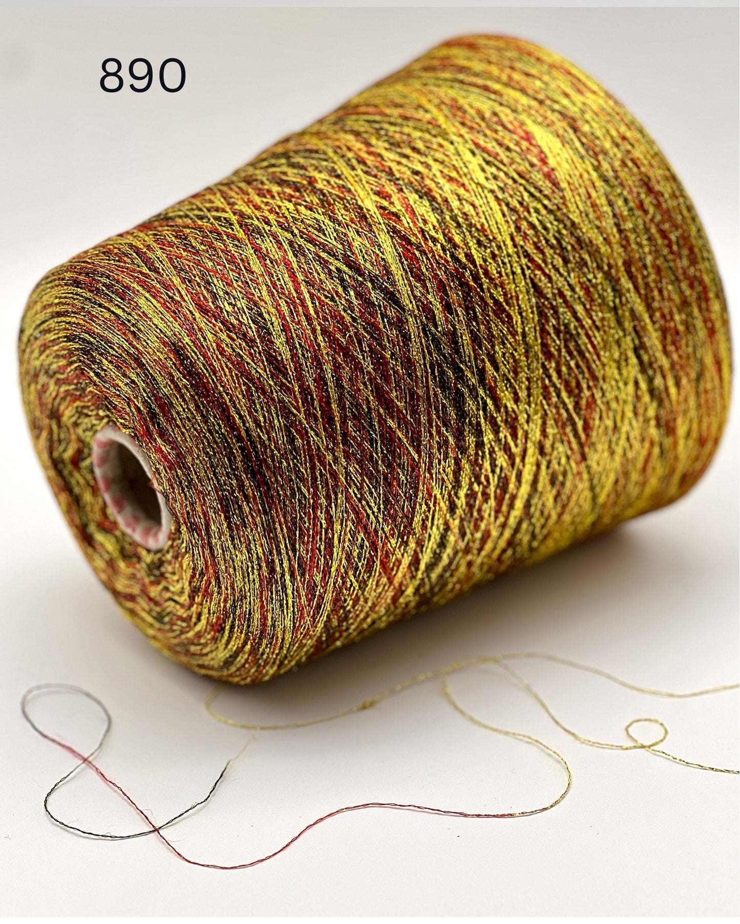 MISSONI DOMASO metallic lurex yarn cone in bright copper orange color, luxury Italian fashion-house yarn