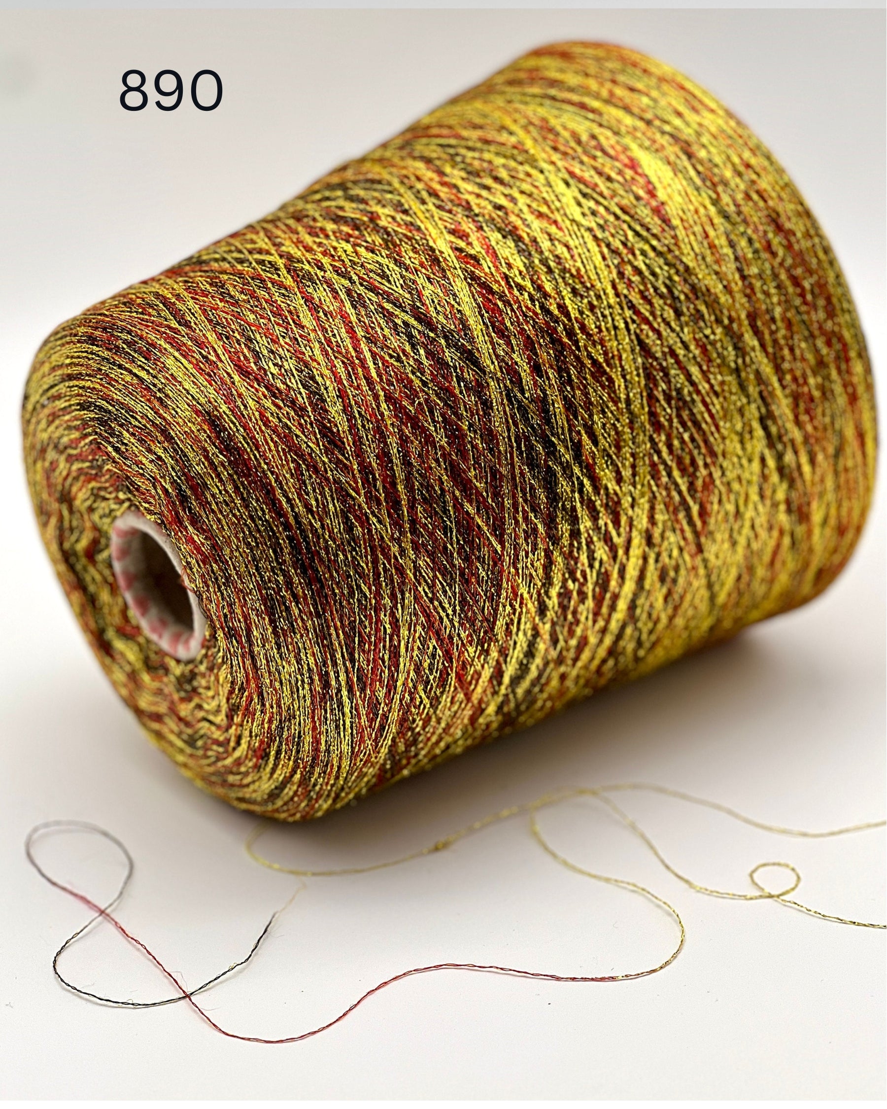 MISSONI DOMASO metallic lurex yarn cone in bright copper orange color, luxury Italian fashion-house yarn