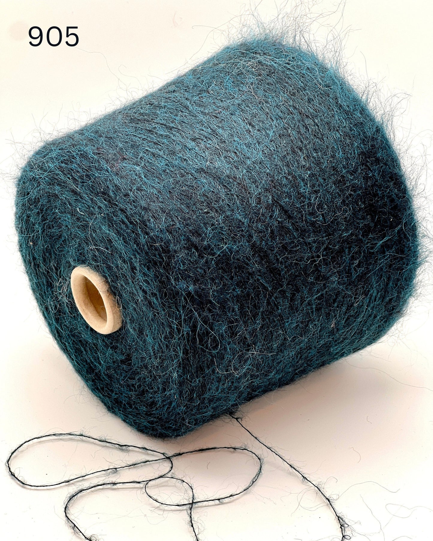 Exclusive iDOKNiT extra fine lace weight yarn, ASTRO by IGEA Italy. A luxury cloud-like blend of 67% superkid mohair, 30% polyamide, and 3% extra fine merino wool providing 1000m per 100g. Authentic Italian-made premium fiber curated by iDOKNiT for airy, delicate lace knitting, lightweight garments, and elegant multi-strand fiber blending.
