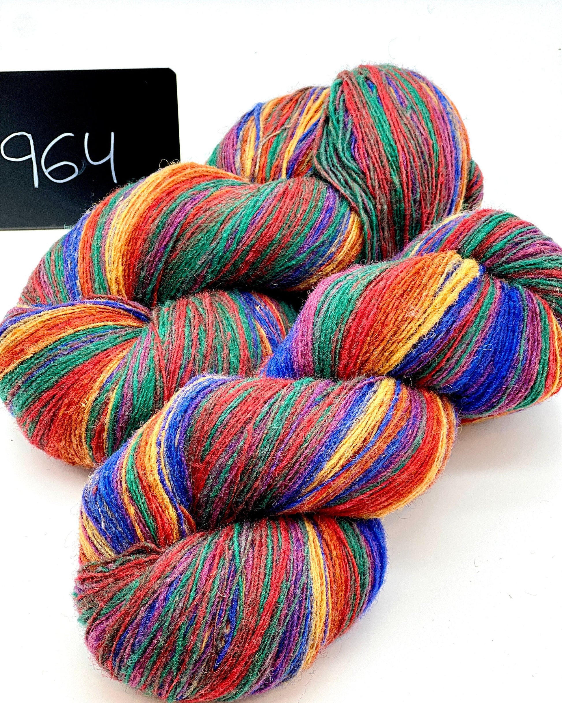 DUNDAGA 6/1 fingering weight single-ply yarn – 70% Latvian wool and 30% Merino blend, high lanolin content for a soft rustic feel, shown in hand-dyed gradients. Ideal for durable socks and heritage knitting with authentic European wool. Available at iDOKNiT.com.