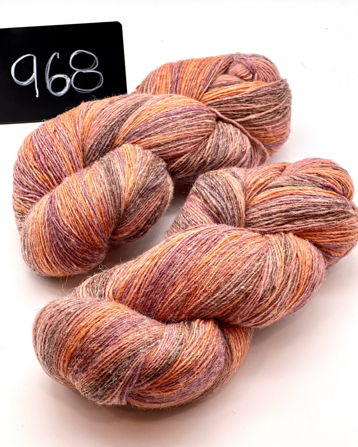 DUNDAGA 6/1 fingering weight single-ply yarn – 70% Latvian wool and 30% Merino blend, high lanolin content for a soft rustic feel, shown in hand-dyed gradients. Ideal for durable socks and heritage knitting with authentic European wool. Available at iDOKNiT.com.