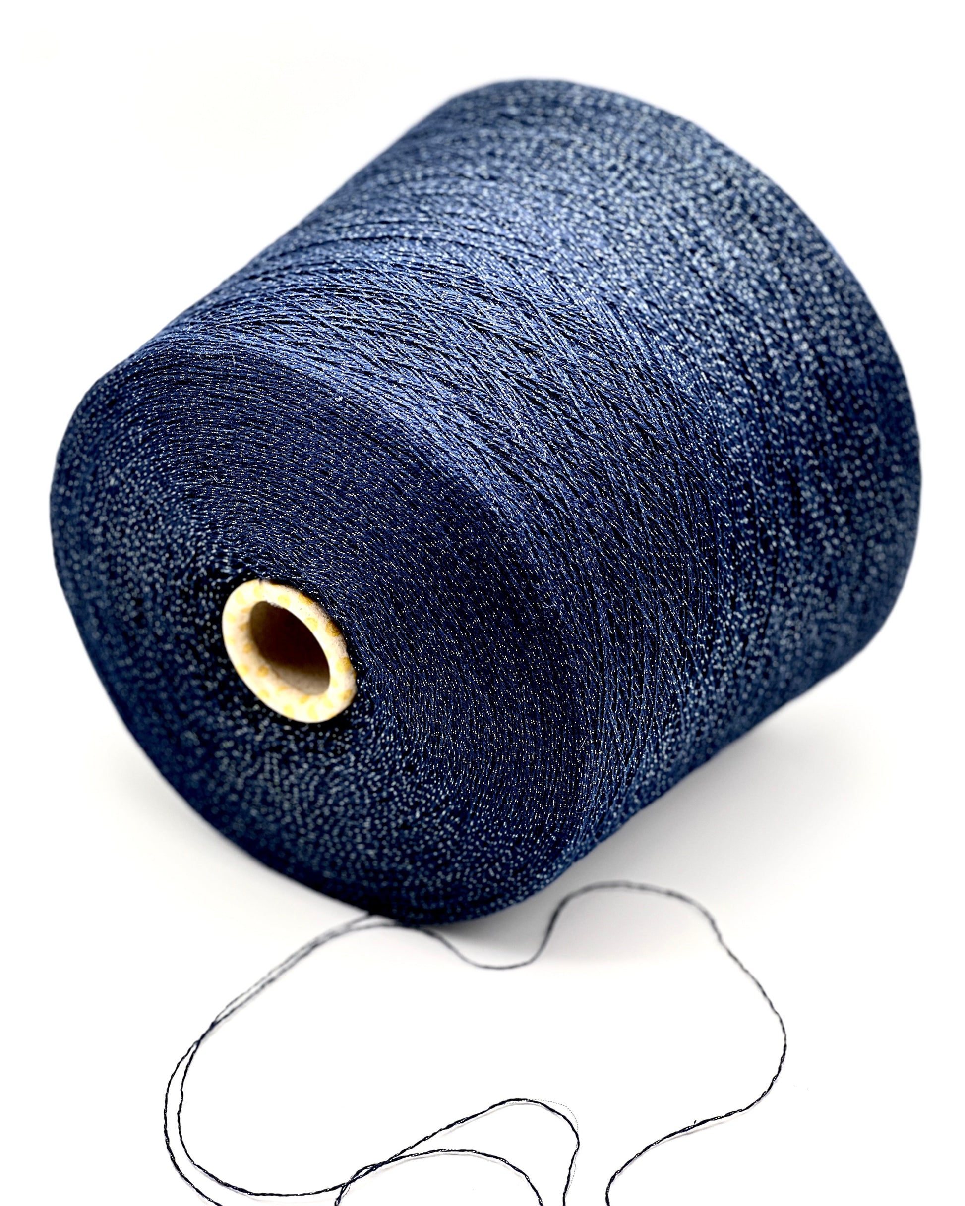 Filati Biagioli Modesto luxury lace yarn shown on a professional cone. This premium Italian blend of cashmere, silk, and cotton features an irregular Lurex thread for subtle shimmer and movement. Sophisticated fashion yarn available at iDOKNiT.com.