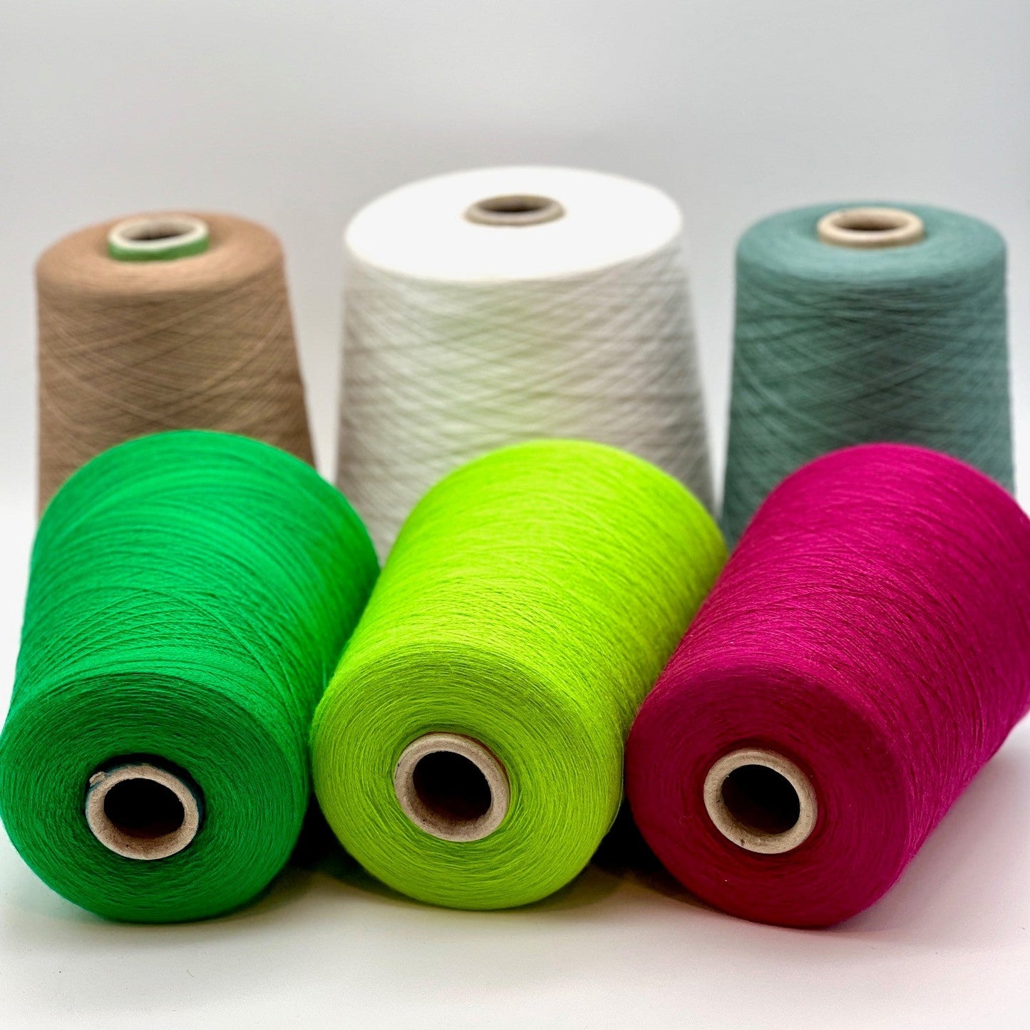 Ultra-fine 100% combed cashmere lace yarn SUPER CASHMERE by Loro Piana on cone, made in Italy. Rare luxury cashmere yarn with exceptional softness, strength, and elegant drape, curated by iDOKNiT for high-end knitting and weaving.