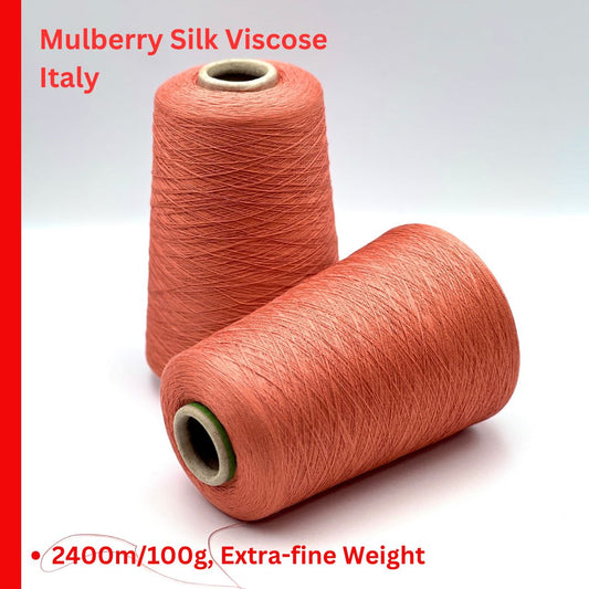 Servizi e Seta VISCOSETTE mulberry silk viscose lace-weight cone yarn in coral color with smooth texture, soft sheen, and elegant drape